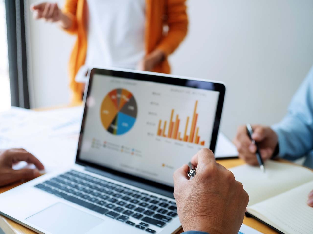 1-3-business-meeting-with-financial-data-in-office-room