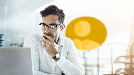 guy looking at screen with yellow human icon behind him