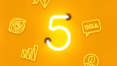 5 lit up with icons around it 