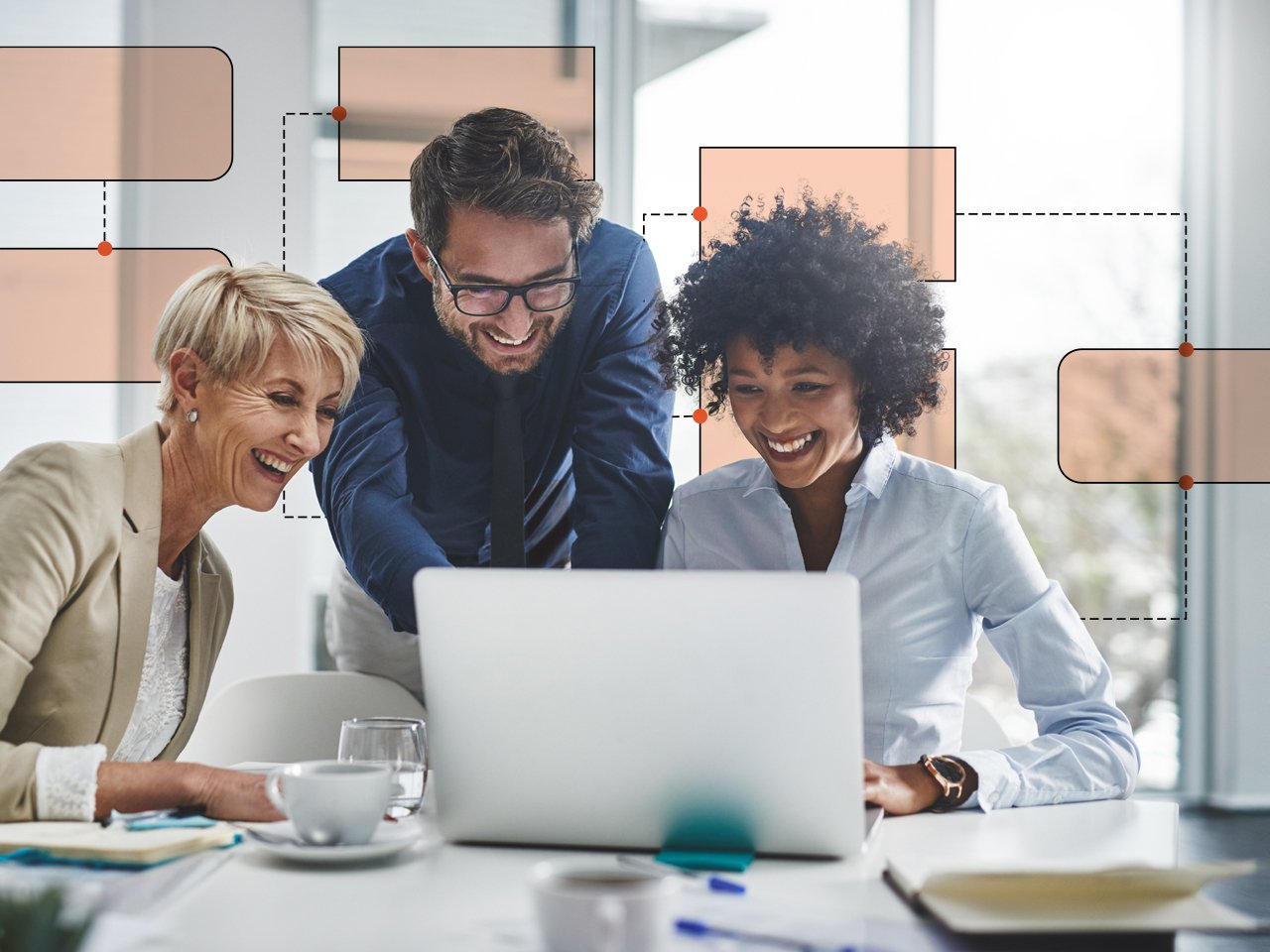 3-business-people-looking-at-laptop