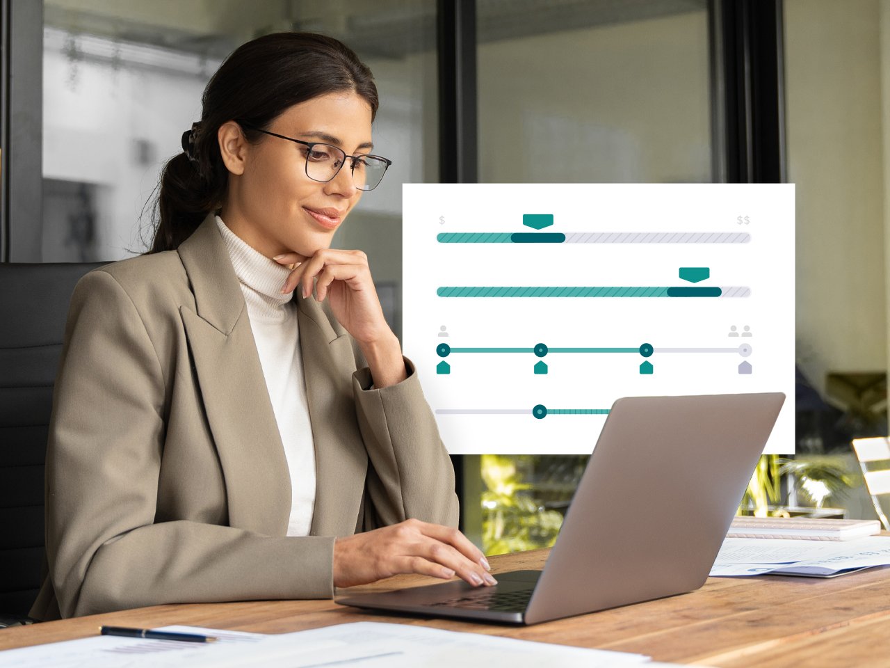 business-woman-looking-at-laptop-with-graphics-in-background